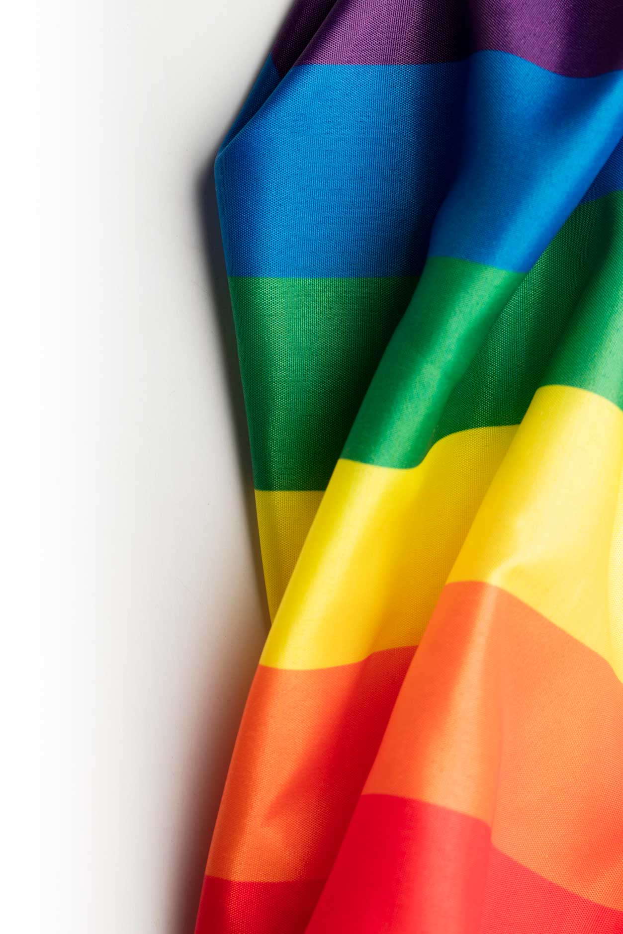 rainbow banner draped over table